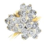 A 9ct gold diamond dress ring. Designed as a brilliant-cut diamond stepped foliate cluster, with