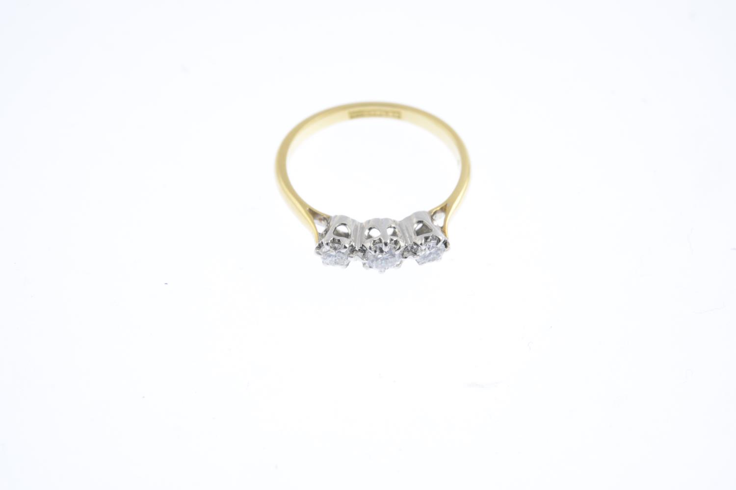 A diamond three-stone ring. Designed as a brilliant-cut diamond graduated line., with tapered - Image 3 of 3