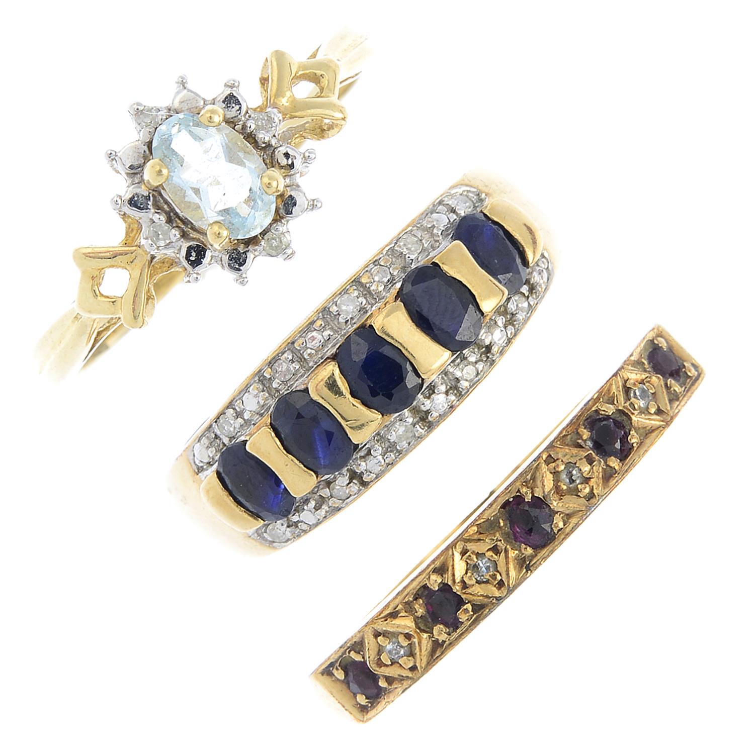 Three 9ct gold diamond and gem-set rings. To include an aquamarine and diamond cluster ring, a