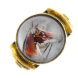 A rock crystal reverse-carved intaglio ring. The circular rock crystal cabochon carved and painted