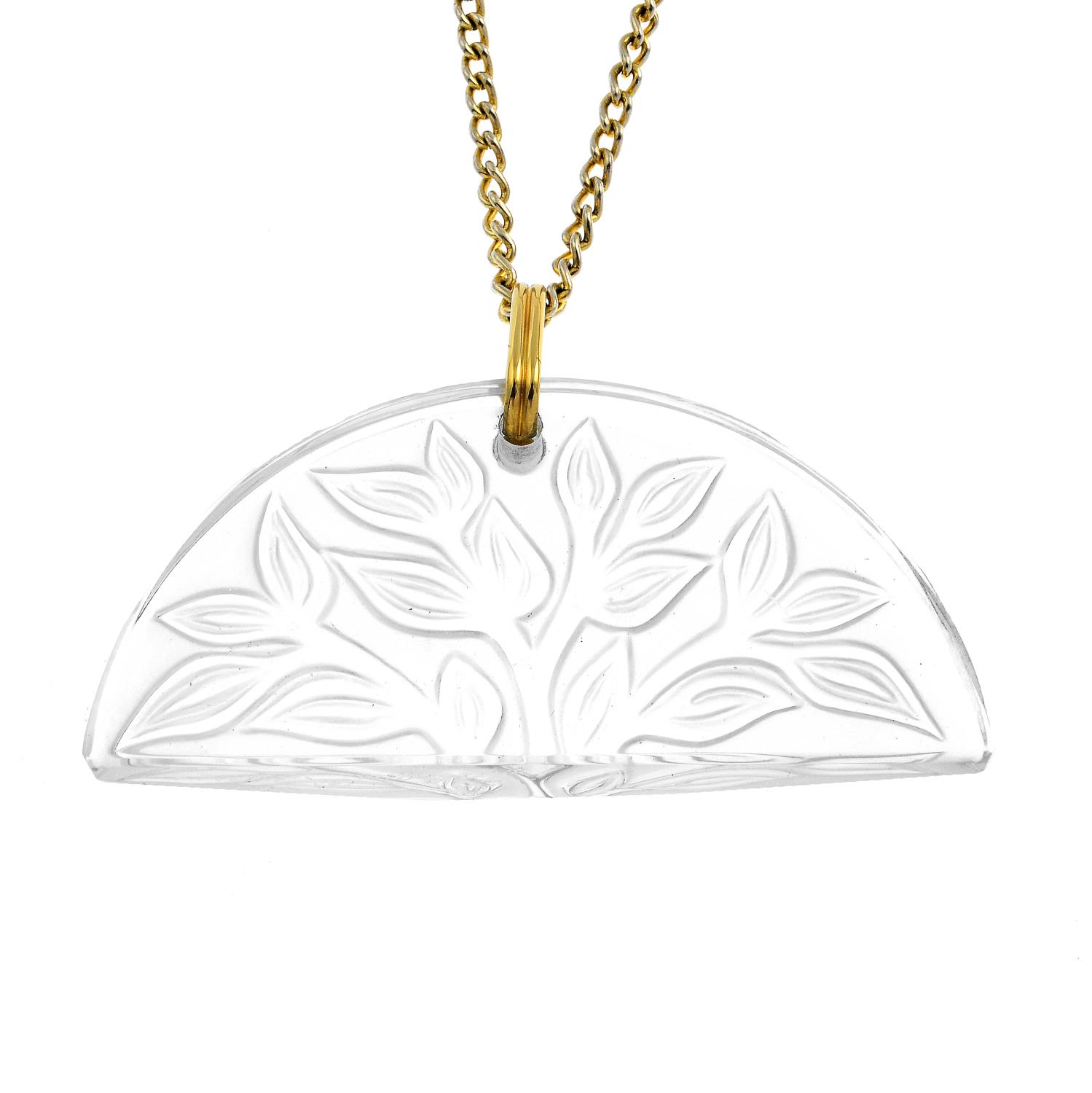 LALIQUE - a 'Tree of Life' pendant. The hemi-circular panel, with impressed foliate and frosted