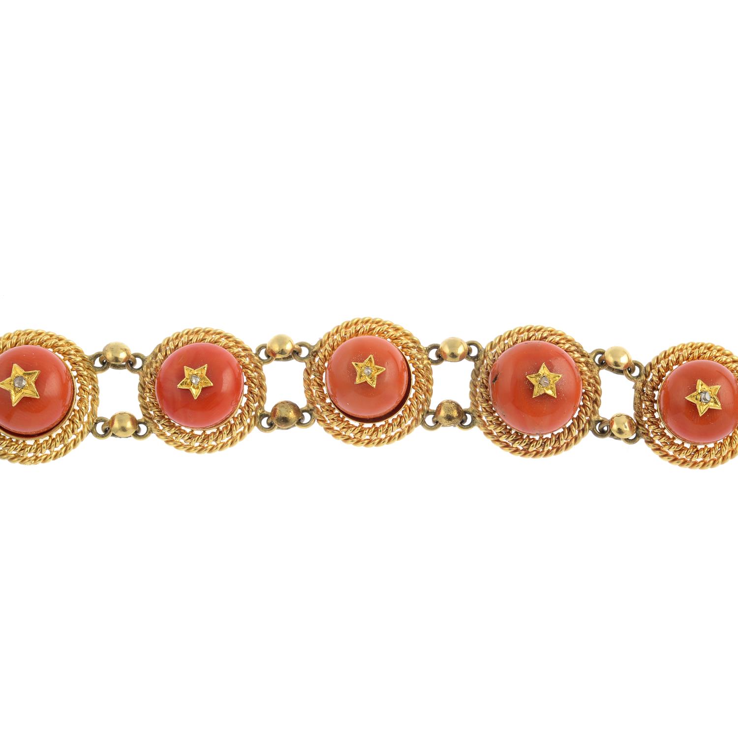 A diamond and coral bracelet. Designed as a series of rose-cut diamond stars, atop a circular