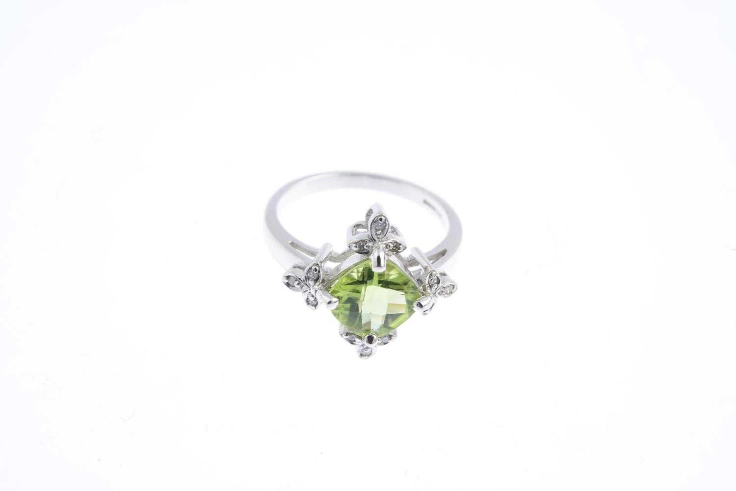 An 18ct gold peridot and diamond dress ring. The square-shape peridot, with single-cut diamond - Image 3 of 3