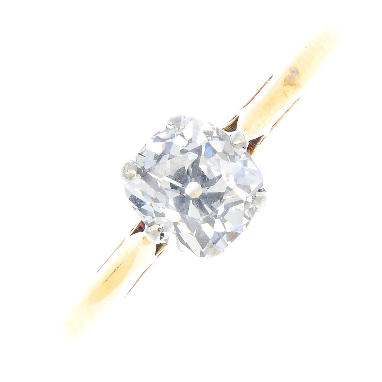 A diamond single-stone ring. The old-cut diamond, with tapered shoulders. Diamond weight 0.79ct, H-I