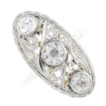 An early 20th century platinum and gold diamond dress ring. The circular-cut diamond collet line,