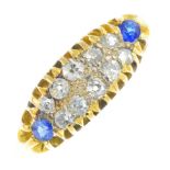 An early 20th century 18ct gold diamond and sapphire ring. The single-cut diamond lines, with