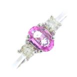 An 18ct gold sapphire and diamond three-stone ring. The oval-shape pink sapphire, with brilliant-cut