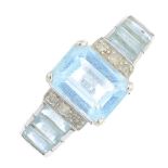 A 9ct gold topaz and diamond ring. The rectangular-shape blue topaz, with pave-set diamond line