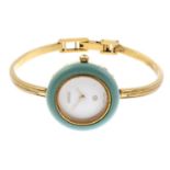 GUCCI - a lady's 1100L bangle watch. Gold plated case with interchangeable bezel. Reference 1100L,