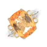 A topaz and diamond ring.