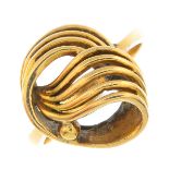 A dress ring. Designed as a stylised knot, with tapered shoulders.