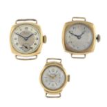 Three lady's 9ct gold watch faces.