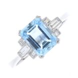 An aquamarine and diamond ring.