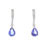 A pair of tanzanite and diamond earrings.