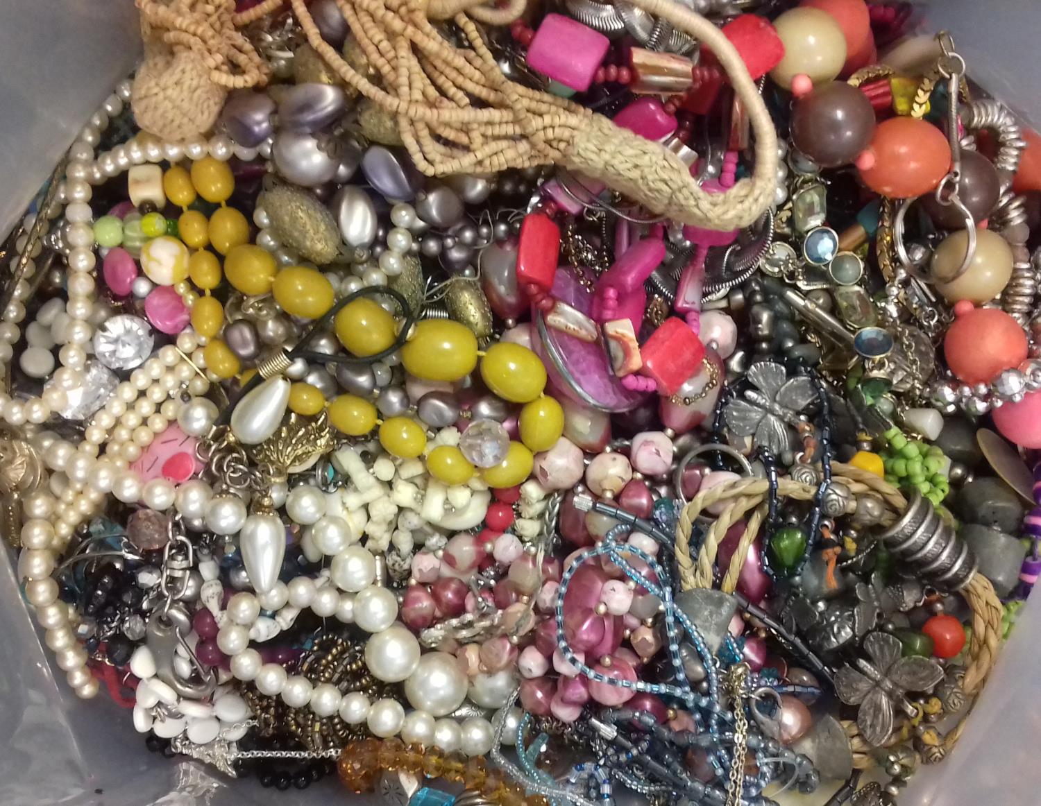 A bag containing a large quantity of costume jewellery. Many AF. Due to the amount of items in - Image 2 of 2