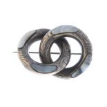 Seven mainly Scottish silver and white metal jewellery. To include an agate knot brooch featuring