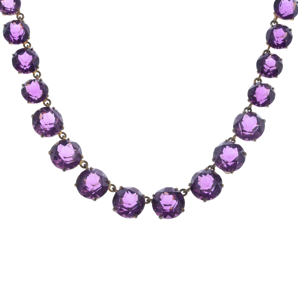 A selection of vintage costume jewellery and components. To include a purple glass necklace of