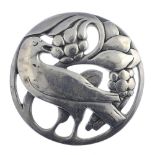 A selection of silver and white metal jewellery. To include a brooch of circular outline featuring a