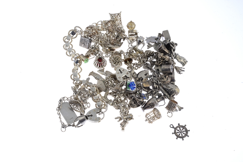 Eight silver and white metal charm bracelets and three further charms. To include a charm bracelet - Image 2 of 2