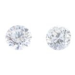 Two diamonds. To include an old-cut diamond, weighing 0.32ct, with a brilliant-cut diamond