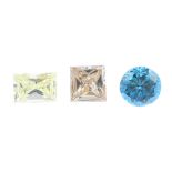 A selection of coloured and colour treated vari-colour diamonds, total weight 1.95cts. To include