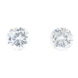 Two brilliant-cut diamonds, weighing 0.25 and 0.27ct. Estimated I-J colour, SI1-P1 clarity. PLEASE