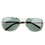 CHLOÉ - a pair of sunglasses. Featuring silver-tone thin metal frames, green tinted oval lenses