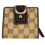 GUCCI - an Abbey compact wallet.