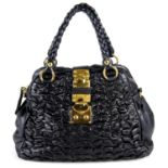 MIU MIU - a lambskin woven handbag.