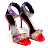 GUCCI - a pair of GG Supreme ankle strap stiletto sandals.