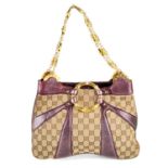 GUCCI by Tom Ford - a Monogram Bamboo Chain handbag.