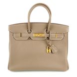 HERMÈS - a 2015 taupe Clemence Birkin 35 handbag.