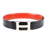 HERMÈS - a reversible logo buckle belt.