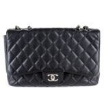CHANEL - a Jumbo Caviar Classic Flap handbag.