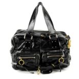 CHLOÉ - a black patent leather Betty handbag.