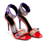GUCCI - a pair of GG Supreme ankle strap stiletto sandals.