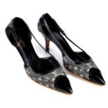 LOUIS VUITTON - a pair of Mini Lin Monogram heeled shoes.