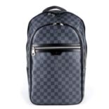 LOUIS VUITTON - a Damier Graphite Michael backpack.