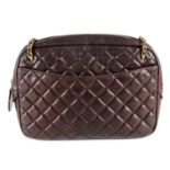CHANEL - a large brown calf leather quilted camera handbag.