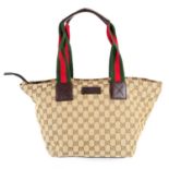 GUCCI - a Monogram Web handbag.