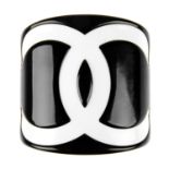 CHANEL - a Resin CC Cuff bracelet.