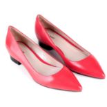 DKNY - a pair of red pointed flat leather shoes.