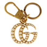 GUCCI - a GG Pearl Key Chain.