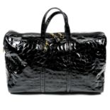 GIANFRANCO FIERRE - a patent leather wheeled travel bag.