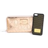 MICHAEL KORS - a wallet and a phone case.