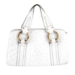 GUCCI - a white ostrich leather handbag.