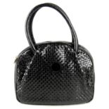 FENDI - a woven leather handbag.