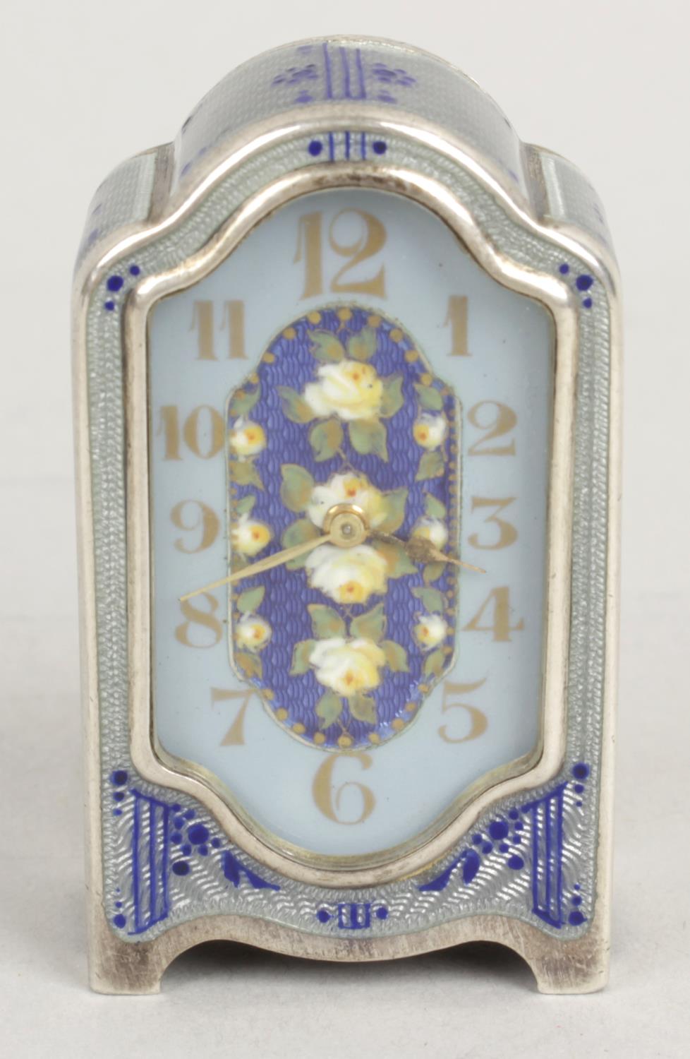 An early 20th century 925 sterling silver and enamelled miniature clock,