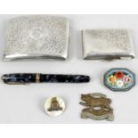 A group of collectables to include two hallmarked silver cigarette cases,