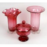 A large quantity of assorted cranberry glassware,